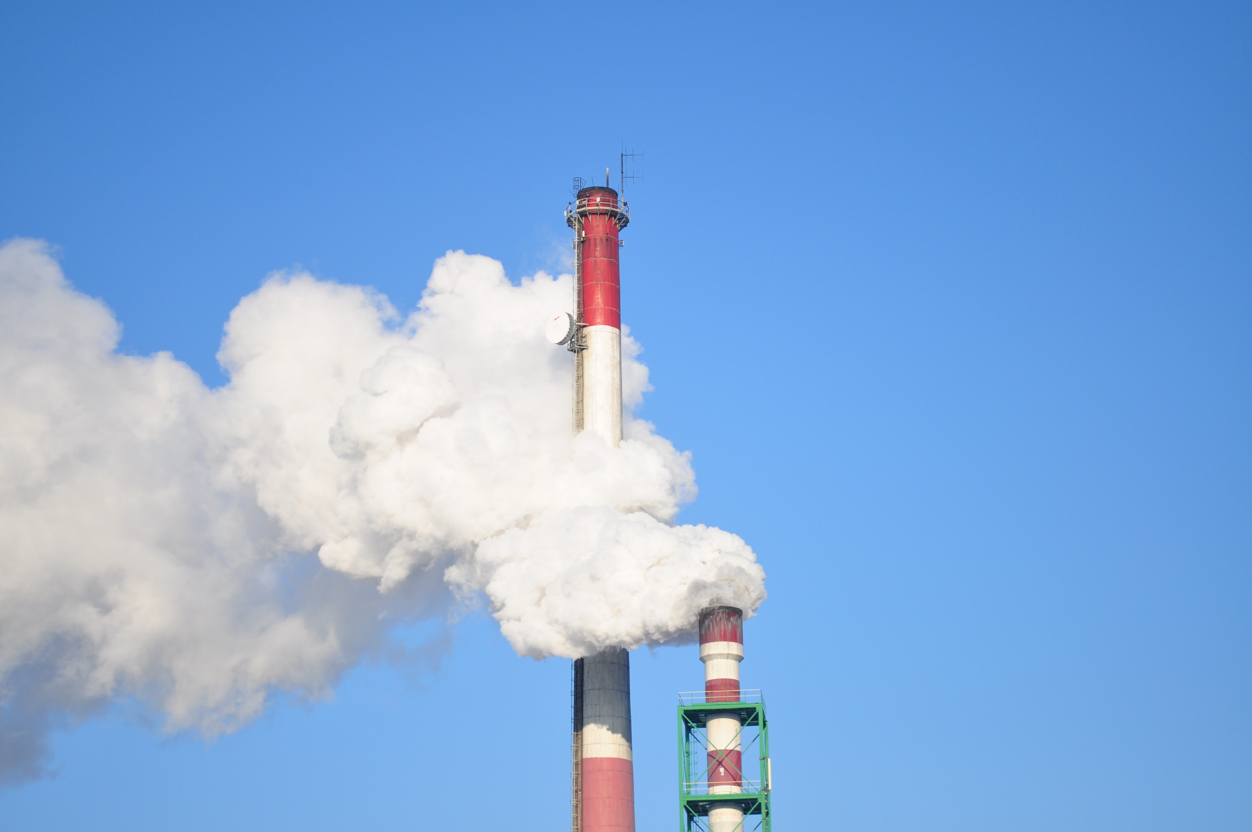 Smoke Stacks Against Blue Sky Smoke Stacks Against Blue Sky