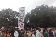 Anti-CAA Banner with the slogan "One North East/One Voice/No CAA, demonstrated at Cultural Protest organised by Artistes of Assam at AEI playground Chandmari.
