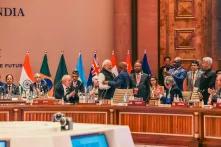 Indian Prime Minister Narendra Modi embracing the African Union Chairman and Comoros President Azali Assoumani, at the opening session of G20