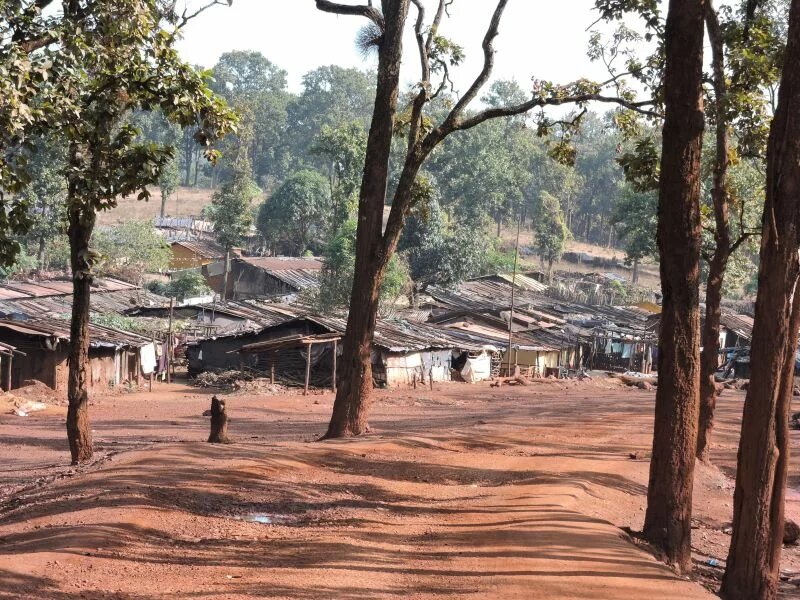 Paudi Bhuyan hamlet next to an iron ore mine in Odisha. Photo by Manju Menon