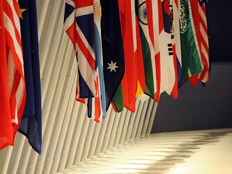 Flags of G20 nations inside the main meeting room of the London Summit, 2 April 2009